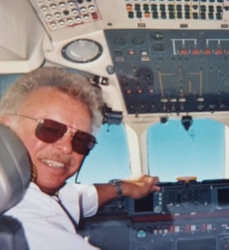 Captain Eddie in the cockpit.